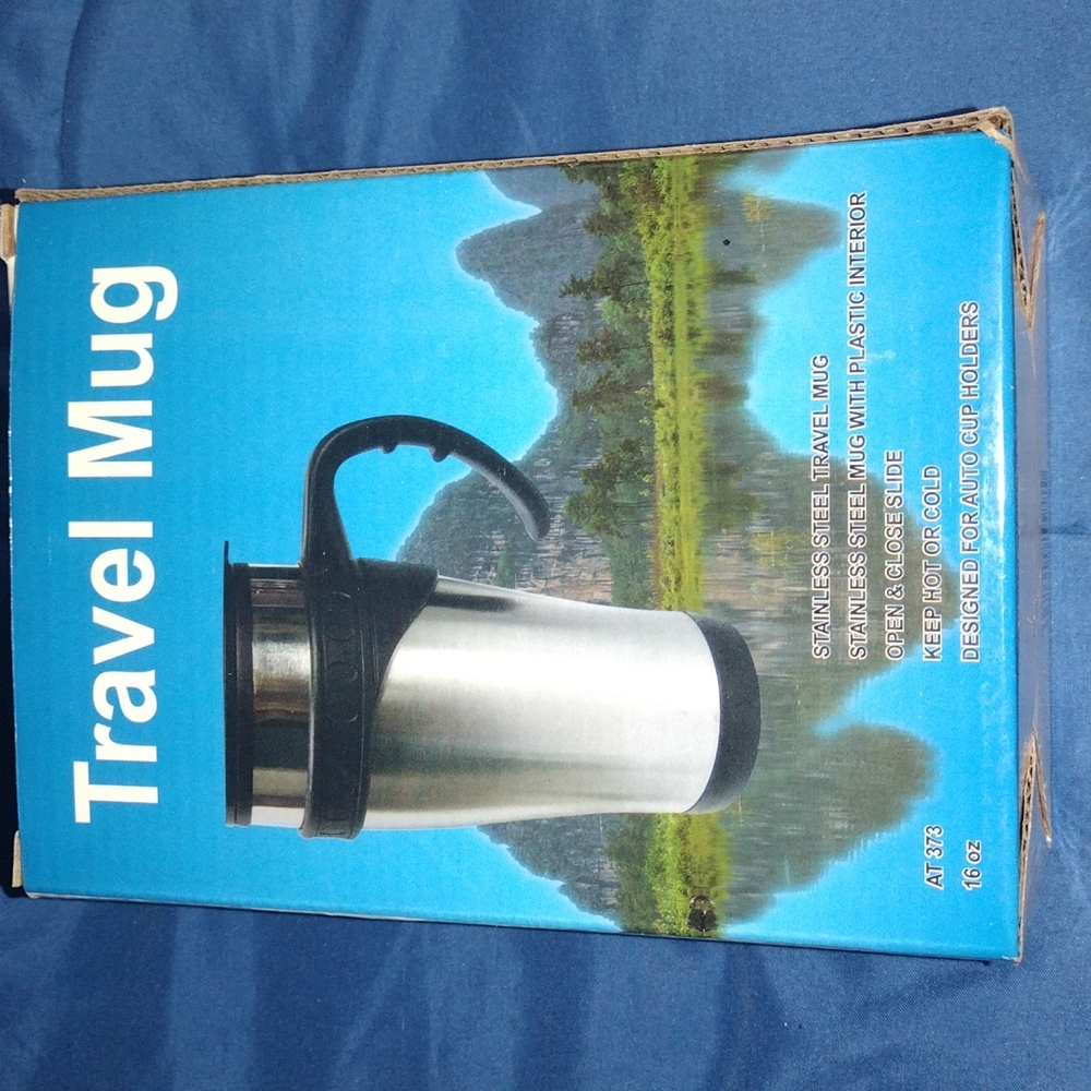 Two, matching stainless steel travel mugs.